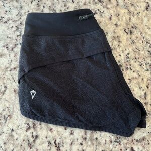 Black Athleta girl flower print shorts size girls 10-12
